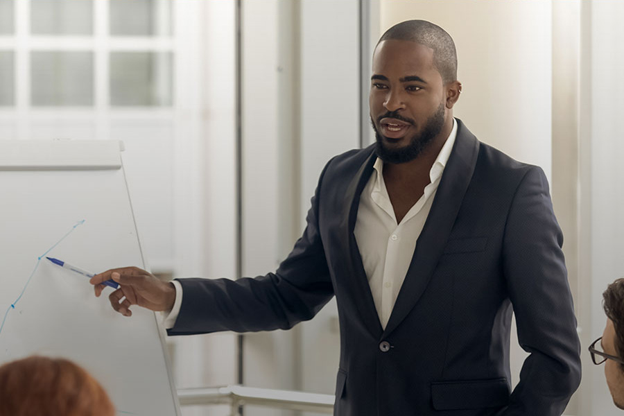 couple with smartphone at business conference