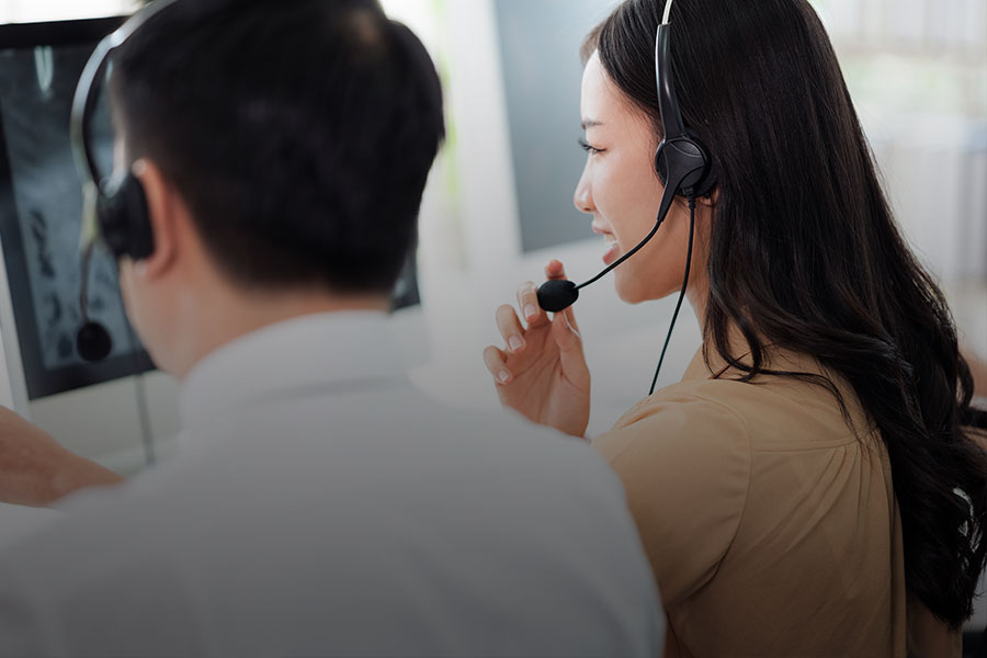 couple with smartphone at business conference